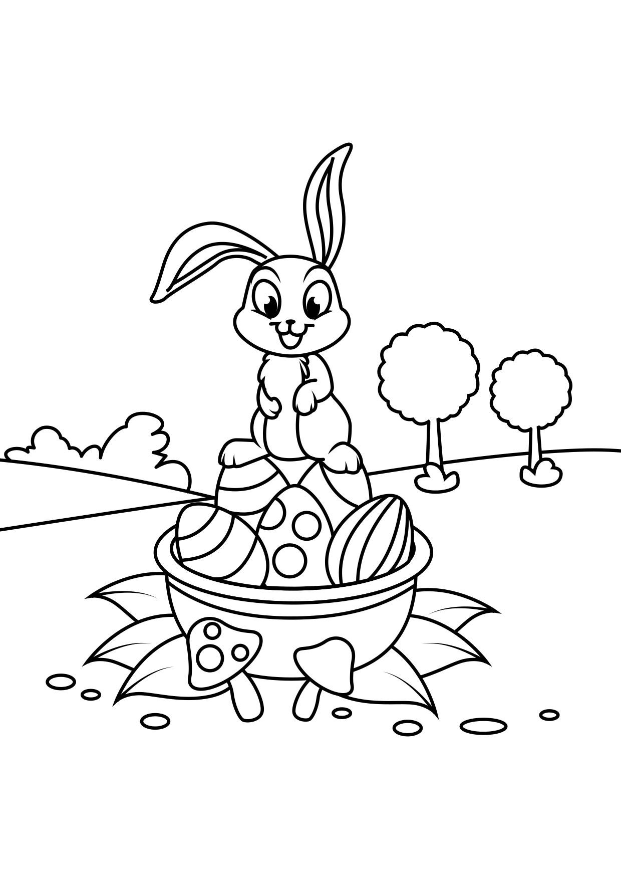 Coloriage lapin de pA¢ques sur panier de pA¢ques