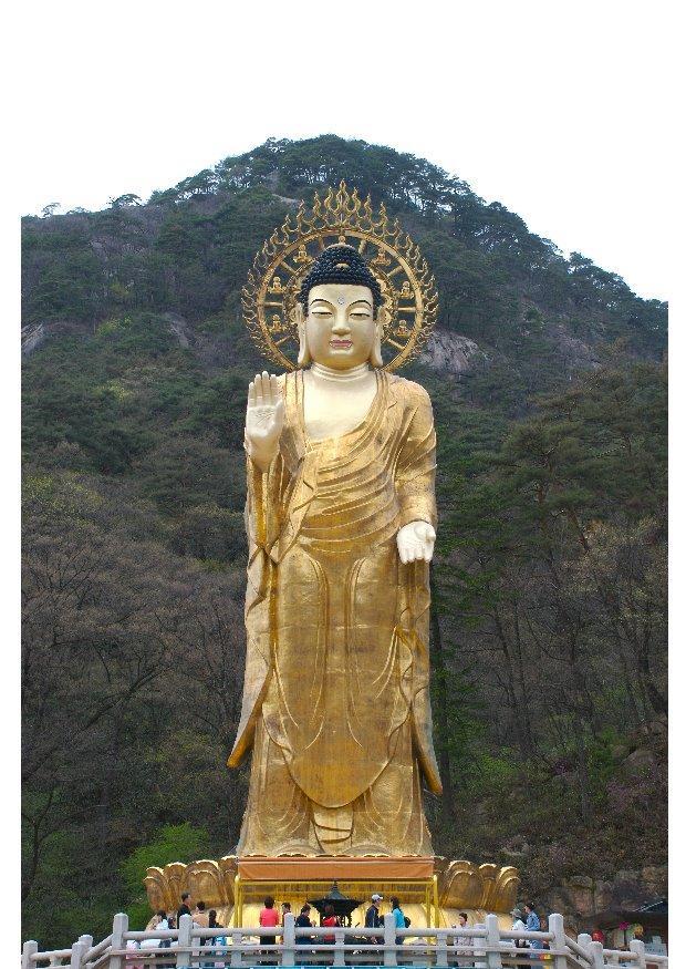 Photo statue en or de maitreya